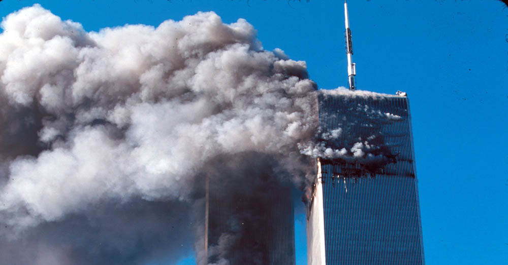 De Twin Towers van het World Trade Center in New York tijdens de aanslagen van 11 septemeber 2001