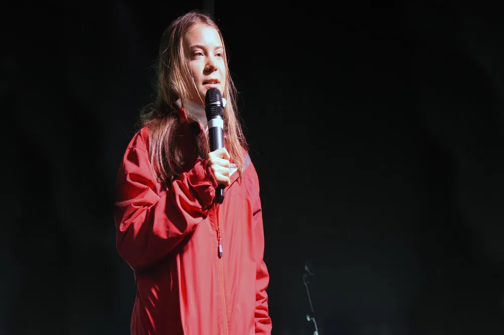 Greta Thunberg tijdens een klimaattoespraak. (Photonews)