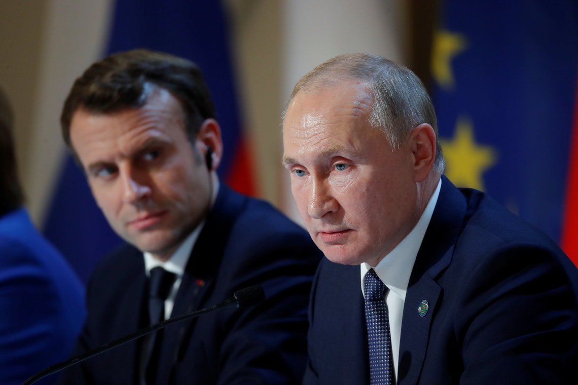 Poetin en Macron. Foto Shutterstock.
