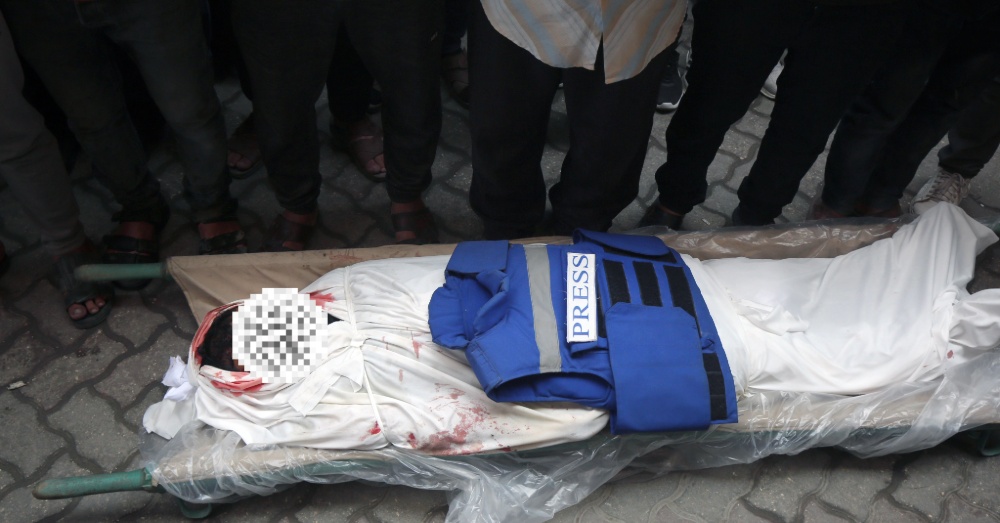 Een gedode journalist in Gaza. Foto: Photonews